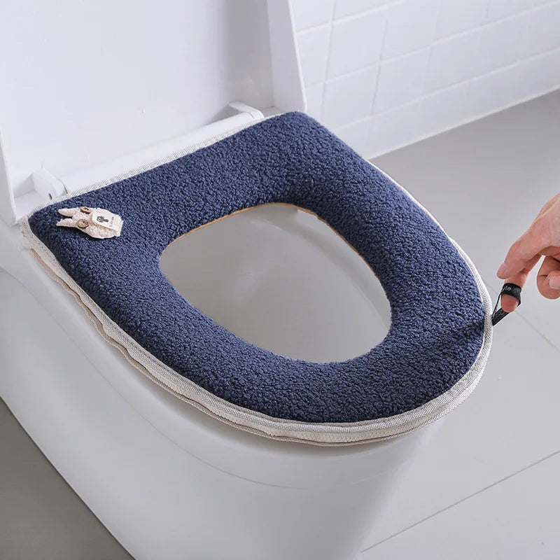 Cojín de lana para el asiento del inodoro con cremallera.