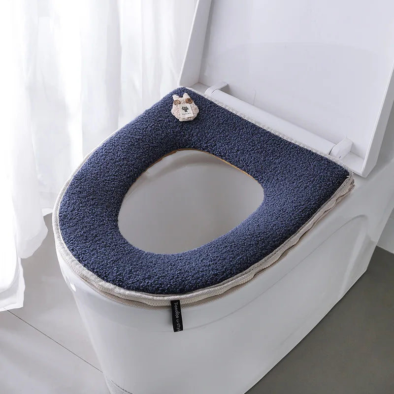 Cojín de lana para el asiento del inodoro con cremallera.